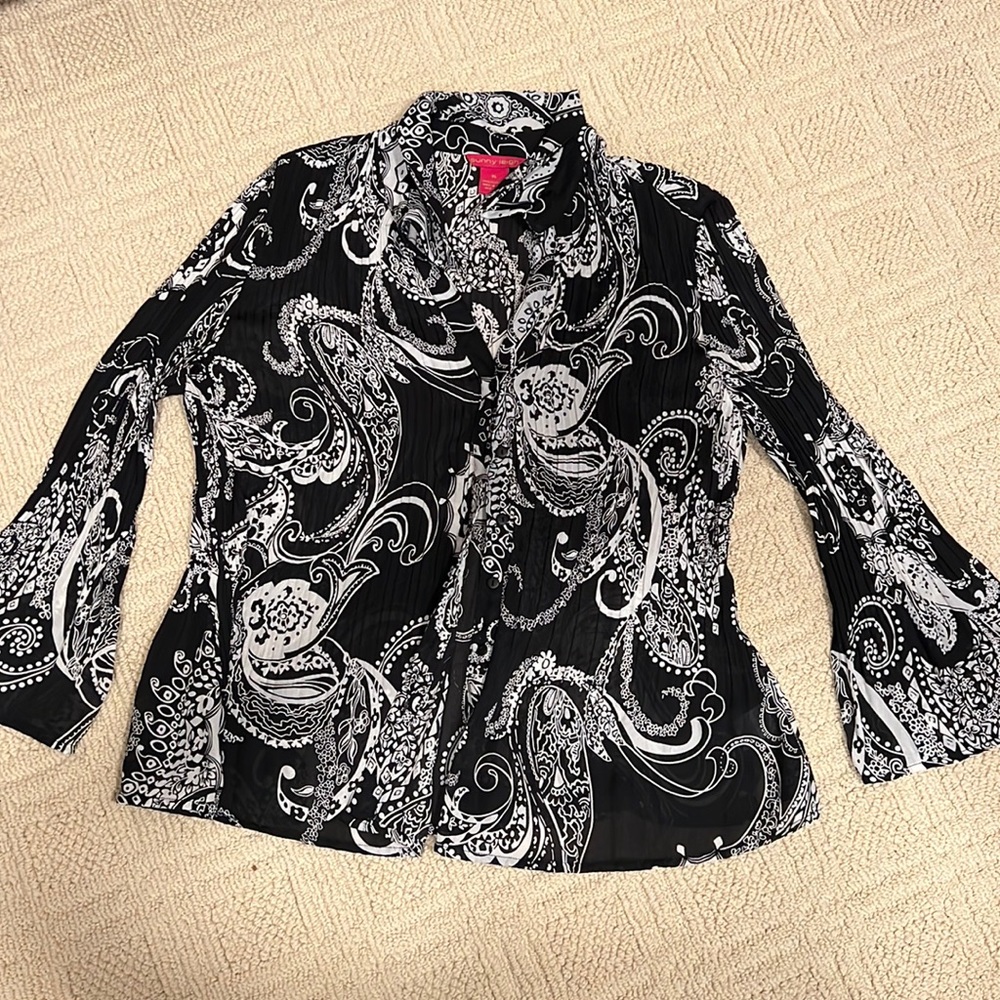 Light, long bell sleeved blouse